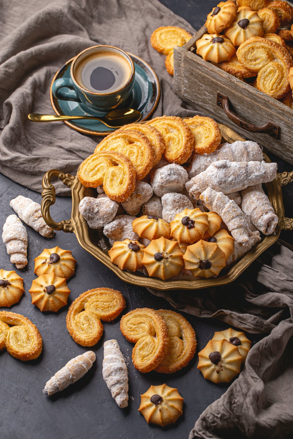 Cookies and a cup of coffee sit on a table.